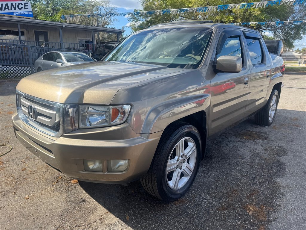 2009 Honda Ridgeline 3.5 Auto RTL w/Leather and Navi's photo
